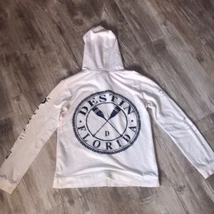 white sweatshirt with “shark bites”